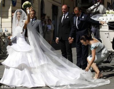Yolanthe's wedding dress is much better than her groom's wedding suit no
