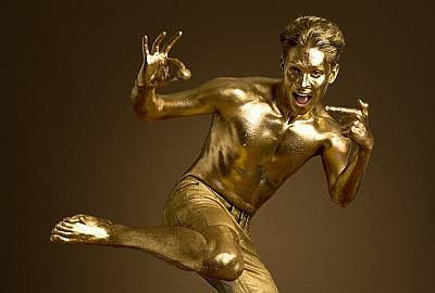 male celebrity body painting - joey essex gold body paint - pizza express2