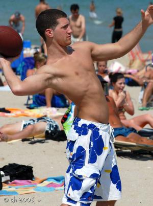 hot guy in wet beach shorts shirtless