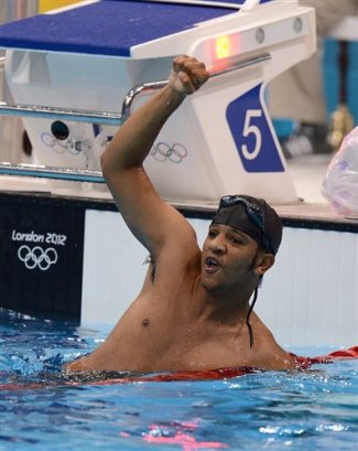 black male swimmers olympics - Christian Nassif - wins heat 50m freestyle