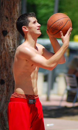 teen boys in basketball shorts