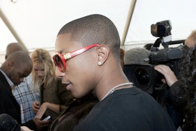male celebrities wearing louis vuitton sunglasses - pharrell evidence millionaires