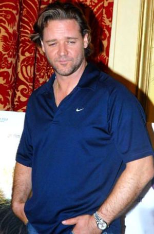 famous men with rolex - russell crowe day date