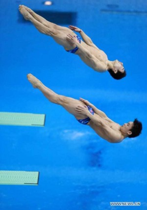 chinese men in speedo top divers