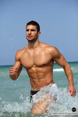 adam ayash shirtless at the beach