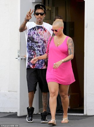 bald female celebrities - Amber Rose showed off her post-baby curves in a short frock as she went shopping with fiance Wiz Khalifa in Beverly Hills on Thursday