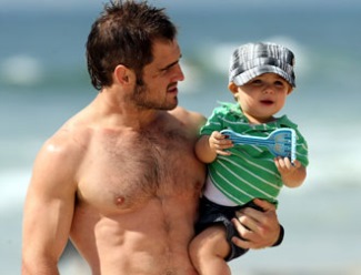 shirtless nathan friend with son axel - 2009