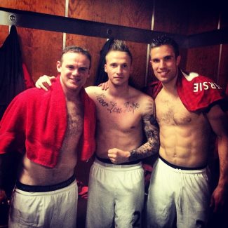 shirtless manchester united footballers ALEXANDER BUTTNER with wayne rooney and robin van persie