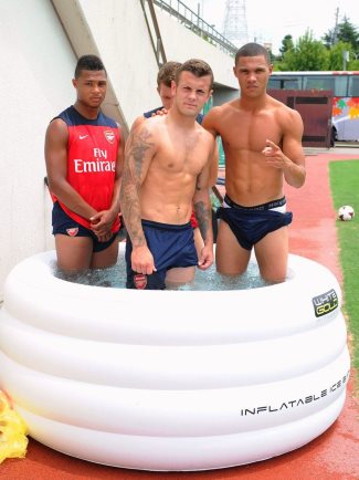 shirtless arsenal footballers - l to r - Serge Gnabry Jack Wilshere and Kieran Gibbs