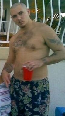 pitbull singer shirtless - swim shorts