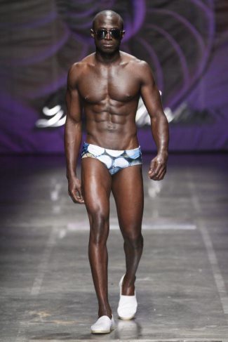 black male model wearing speedo - Dax Martin Fashion Show