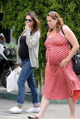 maternity jeans guide - Mila Kunis in a Seraphine Blue Wash Straight Leg Premium Maternity Jeans