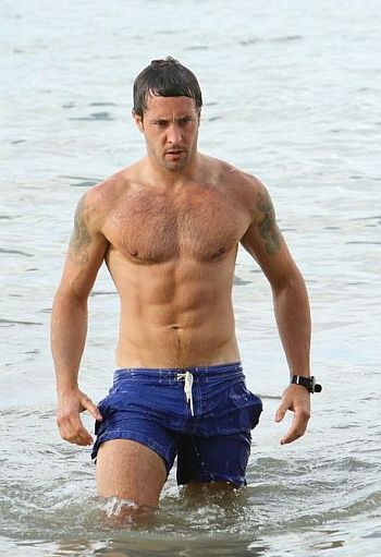 Alex O'Loughlin shirtless in beach shorts