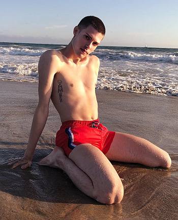 gigi goode shirtless body beach shorts