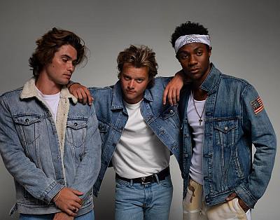 jonathan daviss outer banks denim jacket with chase stokes and rudy pankow
