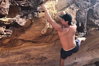 jon prasida shirtless rock climbing