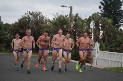 purple speedo for men - Hollard Daredevil Run - prostate cancer awareness in south africa